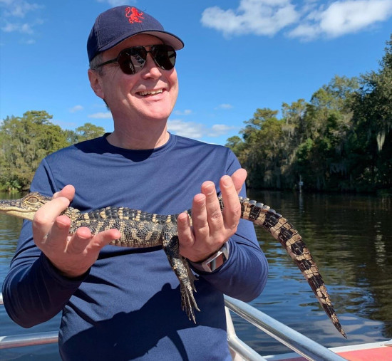 Enjoying NOLA with Fluffy (the baby Alligator)
